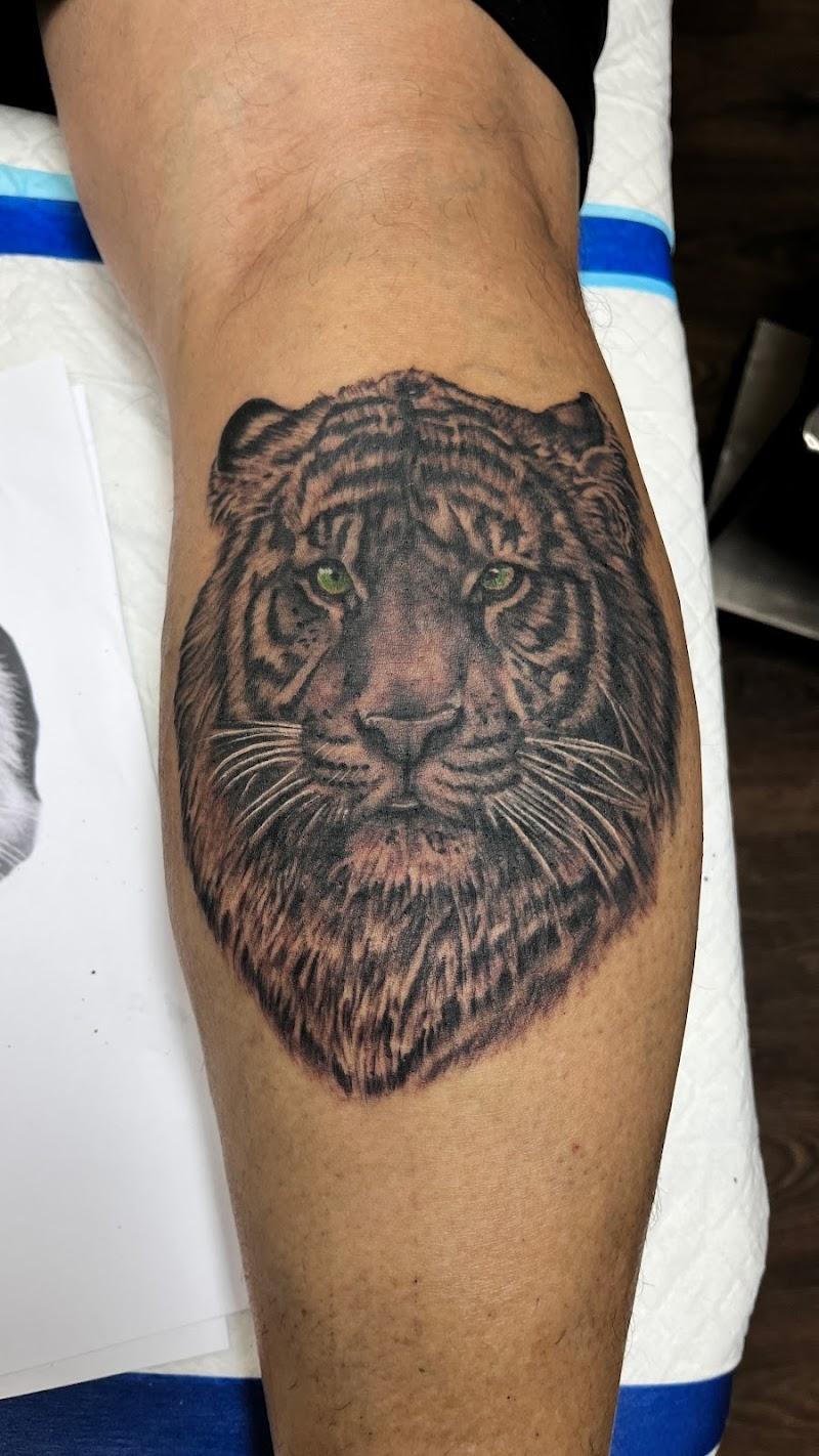 Metal Machine Tattoo Studio - Photo 3